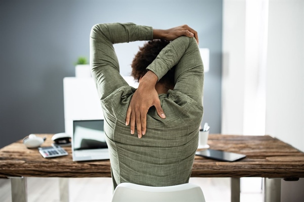 Are you a desk worker? Try this yoga routine designed to ease aches and pains